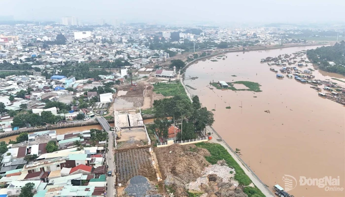 Accelerating construction of Cai Riverside Road