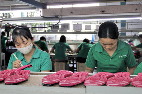Ngành dệt may và da giày tăng trưởng hơn 24% trong năm 2011. Ảnh: V. lâm