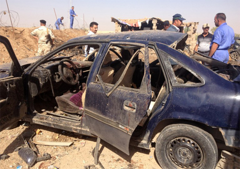 Hiện trường một vụ nổ tại bãi đỗ xe ở thành phố Kirkuk, miền bắc Iraq.