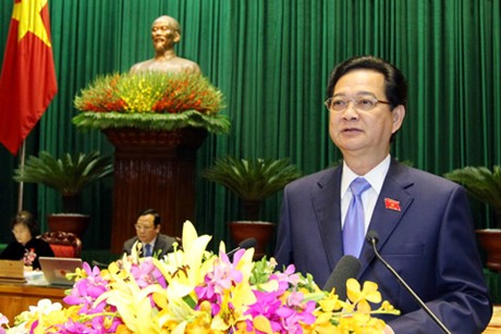 Thủ tướng Nguyễn Tấn Dũng đọc tờ trình Quốc hội xem xét số Phó Thủ tướng nhiệm kỳ Quốc hội Khóa XIII là 5. VGP/Nhật Bắc