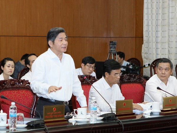 Bộ trưởng Bộ Kế hoạch và Đầu tư Bùi Quang Vinh phát biểu tại phiên họp. (Ảnh: /TTXVN)