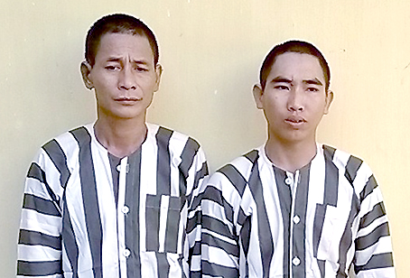 Hai bị can Phạm Anh Tuấn (bên trái) và Trần Thế Linh.