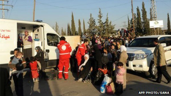 Nhân viên cứu trợ nhân đạo tại Syria. (Nguồn: AFP)