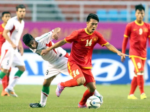 Olympic Việt Nam (áo đỏ) đã làm nên kỳ tích cho bóng đá nước nhà. (Ảnh: Thethaovanhoa.vn)