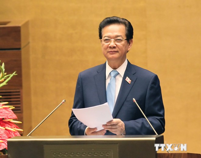 Thủ tướng Nguyễn Tấn Dũng trình bày Báo cáo về tình hình kinh tế-xã hội năm 2014 và nhiệm vụ năm 2015. (Ảnh: TTXVN)