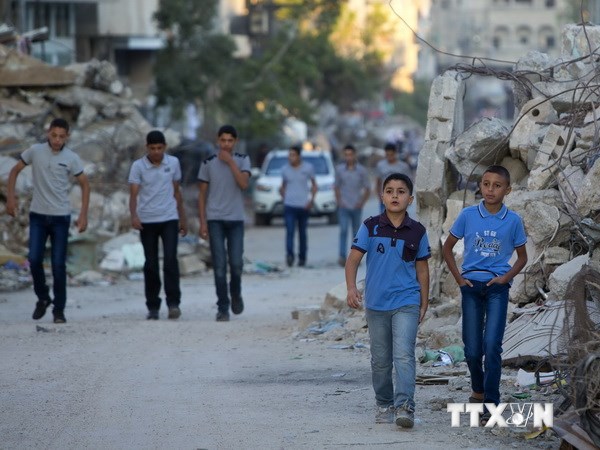 Học sinh Palestine tại Dải Gaza trong ngày đầu tiên của năm học mới 2014. (Ảnh: AFP/TTXVN)