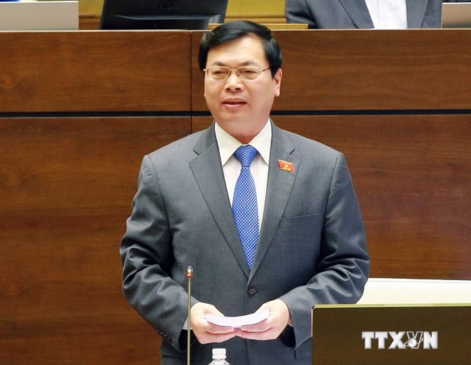 Bộ trưởng Bộ Công thương Vũ Huy Hoàng trả lời chất vấn của đại biểu Quốc hội. (Ảnh: TTXVN)