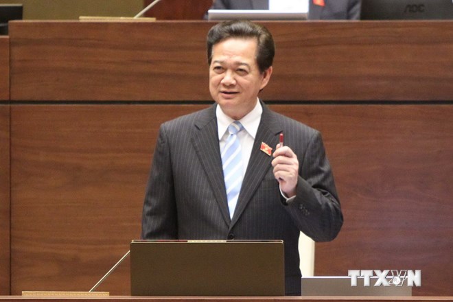 Thủ tướng Nguyễn Tấn Dũng trả lời chất vấn của đại biểu Quốc hội. (Ảnh: TTXVN)