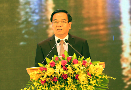 Đồng chí Bí thư Tỉnh ủy Trần Đình Thành đọc diễn văn tại lễ kỷ niệm. (Ảnh: Huy Anh)