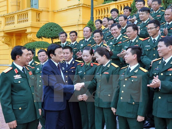 Chủ tịch nước Trương Tấn Sang với các đại biểu. (Ảnh: TTXVN)