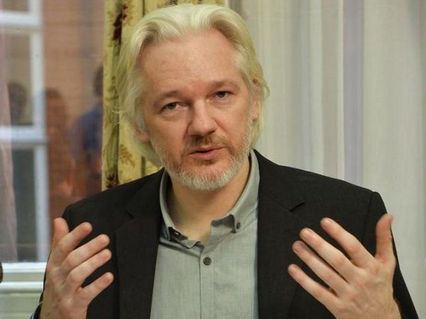 Người sáng lập WikiLeaks Julian Assange tại một cuộc họp báo của Đại sứ quán Ecuador ở trung tâm London ngày 18/8/2014. (Nguồn: Reuters)