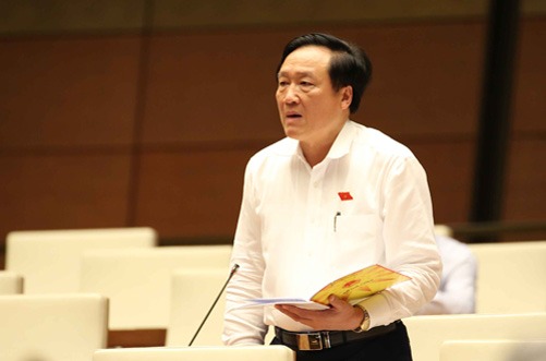 Viện trưởng VKSNDTC Nguyễn Hòa Bình báo cáo bổ sung làm rõ ý kiến của đại biểu Quốc hội. Ảnh: TTXVN 