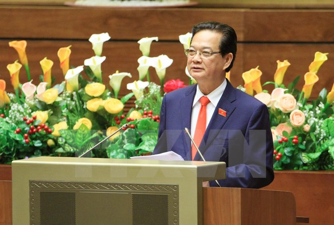 Thủ tướng Nguyễn Tấn Dũng trình bày báo cáo trước Quốc hội. (Ảnh: Doãn Tấn/TTXVN)