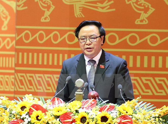 Đồng chí Hoàng Bình Quân, Ủy viên Trung ương Đảng, Trưởng Ban Đối ngoại Trung ương trình bày tham luận tại Đại hội Đảng toàn quốc lần thứ XII. (Nguồn: TTXVN)