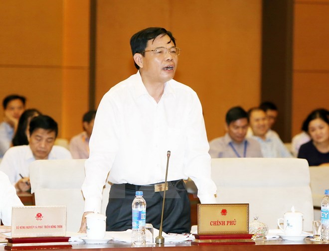 Bộ trưởng Bộ Nông nghiệp và Phát triển Nông thôn Nguyễn Xuân Cường phát biểu tại phiên họp. (Ảnh: Nguyễn Dân/TTXVN)