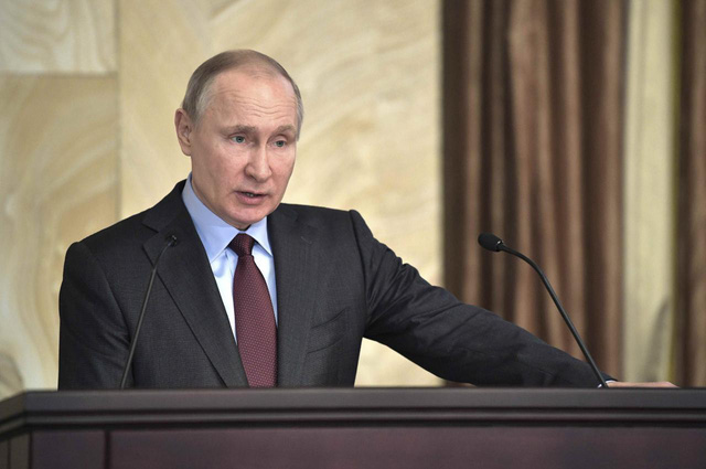 Tổng thống Nga Vladimir Putin vẫn tin tưởng dẫn dắt nước Nga vượt qua khó khăn - Ảnh: REUTERS