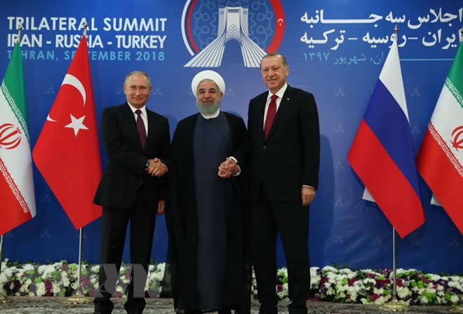 Tổng thống Nga Vladimir Putin, Tổng thống Iran Hassan Rouhani và Tổng thống Thổ Nhĩ Kỳ Tayyip Erdogan tại Hội nghị thượng đỉnh ba bên về Syria ở Tehran (Iran) ngày 6/9. (Nguồn: AFP/TTXVN)