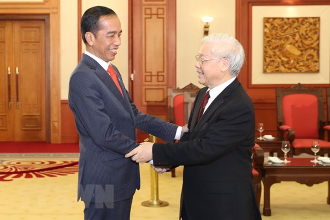 Tổng Bí thư Nguyễn Phú Trọng tiếp Tổng thống Cộng hòa Indonesia Joko Widodo. (Ảnh: Trí Dũng/TTXVN)