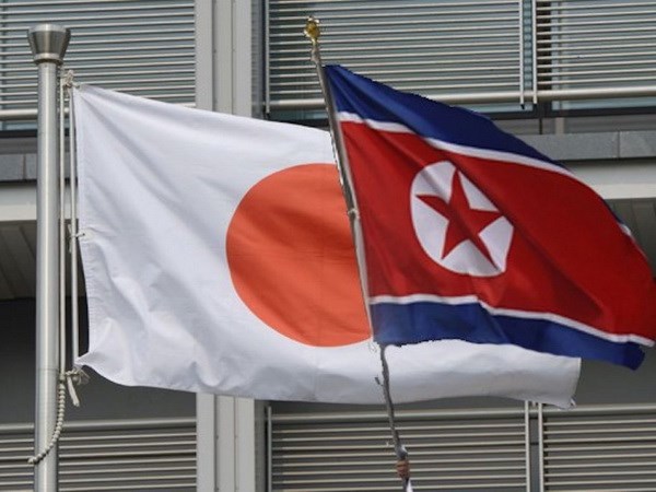 Quốc kỳ của Nhật Bản và Triều Tiên. (Nguồn: AFP)