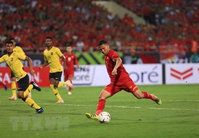 Pha dứt điểm của tiền đạo Anh Đức (số 11), nâng tỷ số lên 2-0 cho Việt Nam ở phút 59. (Ảnh: Trọng Đạt/TTXVN)