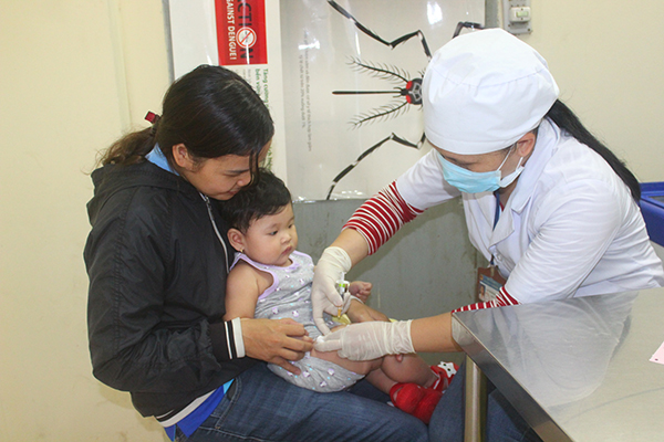 Trẻ tiêm phòng vaccine tại Trung tâm y tế dự phòng Đồng Nai.