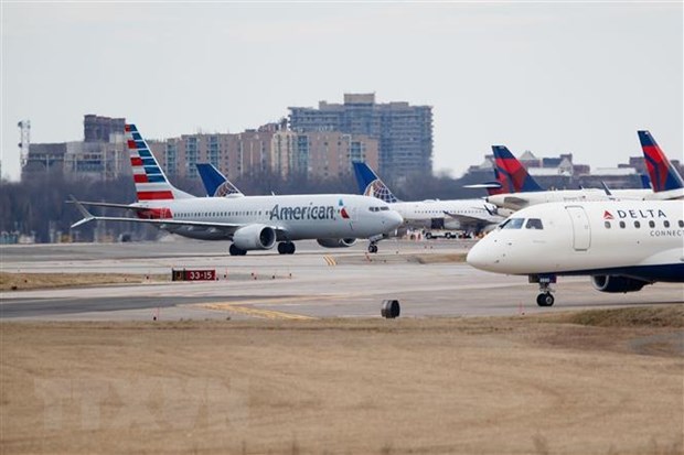 Máy bay Boeing 737 Max 8 của Hãng hàng không American Airlines hạ cánh tại sân bay quốc gia Reagan ở Washington DC., ngày 13-3-2019. (Ảnh: THX/TTXVN)