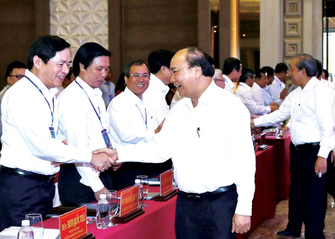 Thủ tướng Nguyễn Xuân Phúc và các đại biểu tham dự hội nghị. Ảnh: TTXVN