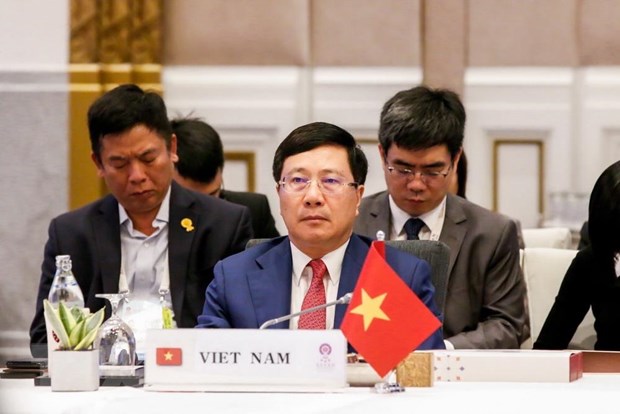 Phó Thủ tướng, Bộ trưởng Ngoại giao Phạm Bình Minh dự Hội nghị AMM. (Ảnh: Ngọc Quang/TTXVN)