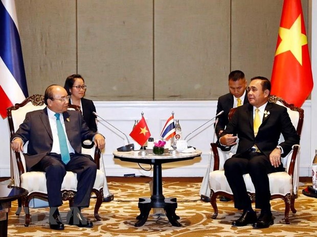 Thủ tướng Nguyễn Xuân Phúc hội kiến Thủ tướng Vương quốc Thái Lan Prayuth Chan-o-cha. (Ảnh: Thống Nhất/TTXVN)