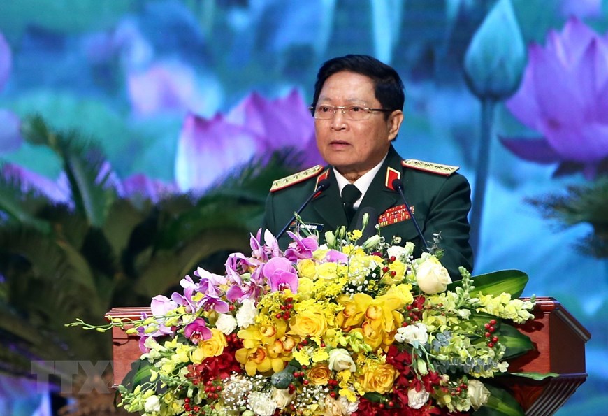 Đại tướng Ngô Xuân Lịch, Uỷ viên Bộ Chính trị, Phó Bí thư Quân uỷ Trung ương, Bộ trưởng Bộ Quốc phòng đọc diễn văn kỷ niệm. (Ảnh: Dương Giang/TTXVN)