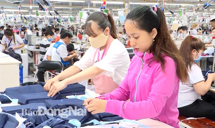 Dệt may là một trong những ngành hàng phụ thuộc nhiều vào nguồn nguyên liệu từ Trung Quốc Ảnh: VƯƠNG THẾ