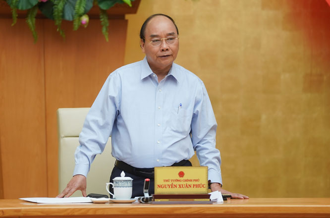 Thủ tướng Nguyễn Xuân Phúc phát biểu tại cuộc họp - Ảnh: VGP/Quang Hiếu.
