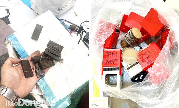 Thiết bị làm biển số giả, con dấu giả được thu giữ tại một cơ sở làm giấy tờ giả ở P.Phước Tân (TP.Biên Hòa).