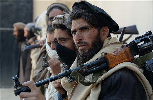 Các tay súng Taliban tại một khu vực ở Jalalabad, Afghanistan. Ảnh: AFP/TTXVN
