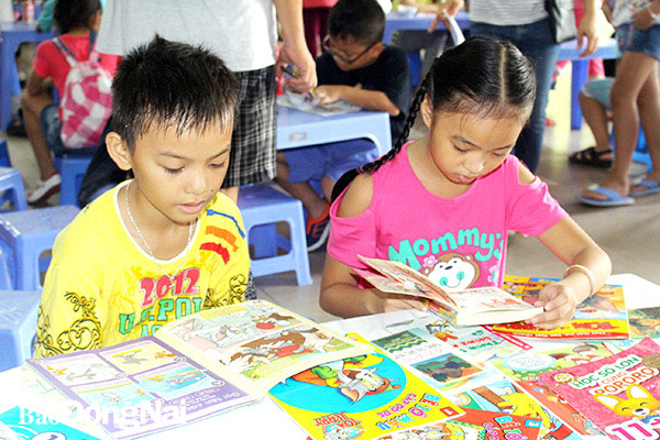 Các em thiếu nhi trên địa bàn TP.Biên Hòa đọc sách tại Nhà thiếu nhi Đồng Nai. Ảnh: Ly Na