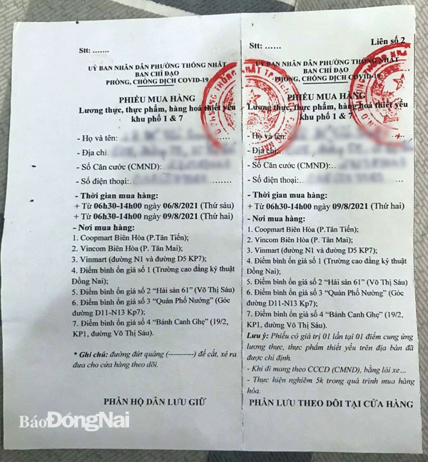 Một mẫu phiếu đi chợ được phát tới người dân tại TP.Biên Hòa.