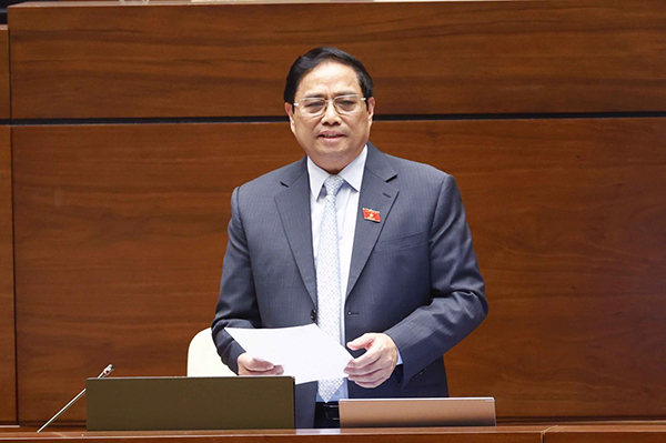 Thủ tướng Chính phủ Phạm Minh Chính trả lời chất vấn của đại biểu Quốc hội. (Ảnh: Doãn Tấn/TTXVN)
